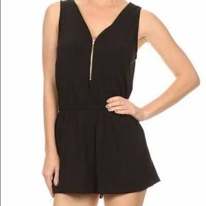 Black romper with zipper accent
